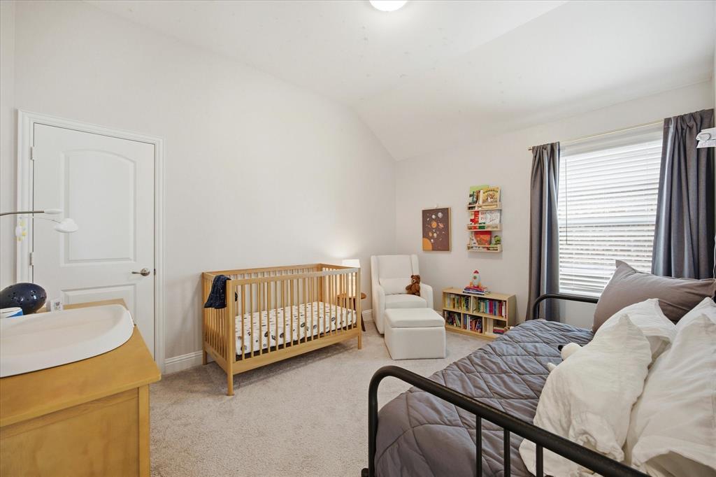 809 Mildren Lane Fate, TX 75087 - Photo 18 of 32 The third bedroom in the home.