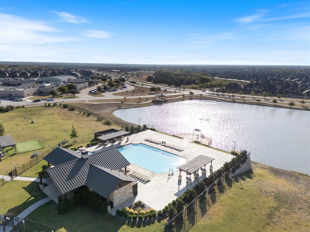 809 Mildren Lane Fate, TX 75087 - Photo 29 of 32 Woodcreek amenities, including pool and stocked pond.
