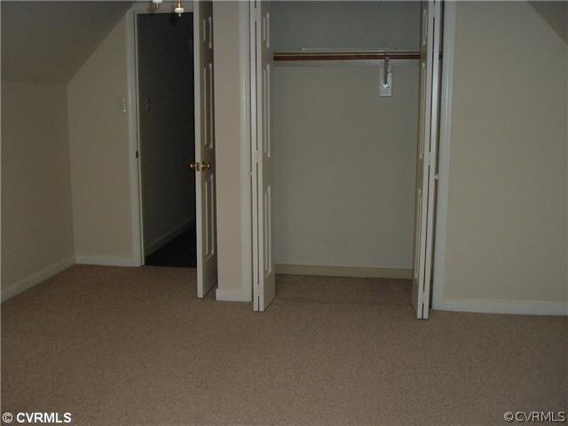 21810 Sappony Road Moseley, VA 23120 - Photo 18 of 24 an empty room with sliding door