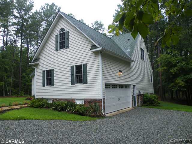 21810 Sappony Road Moseley, VA 23120 - Photo 2 of 24 a view of a house with a yard