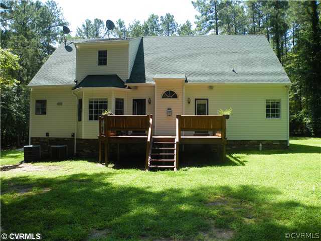 21810 Sappony Road Moseley, VA 23120 - Photo 24 of 24 a front view of house with yard and green space