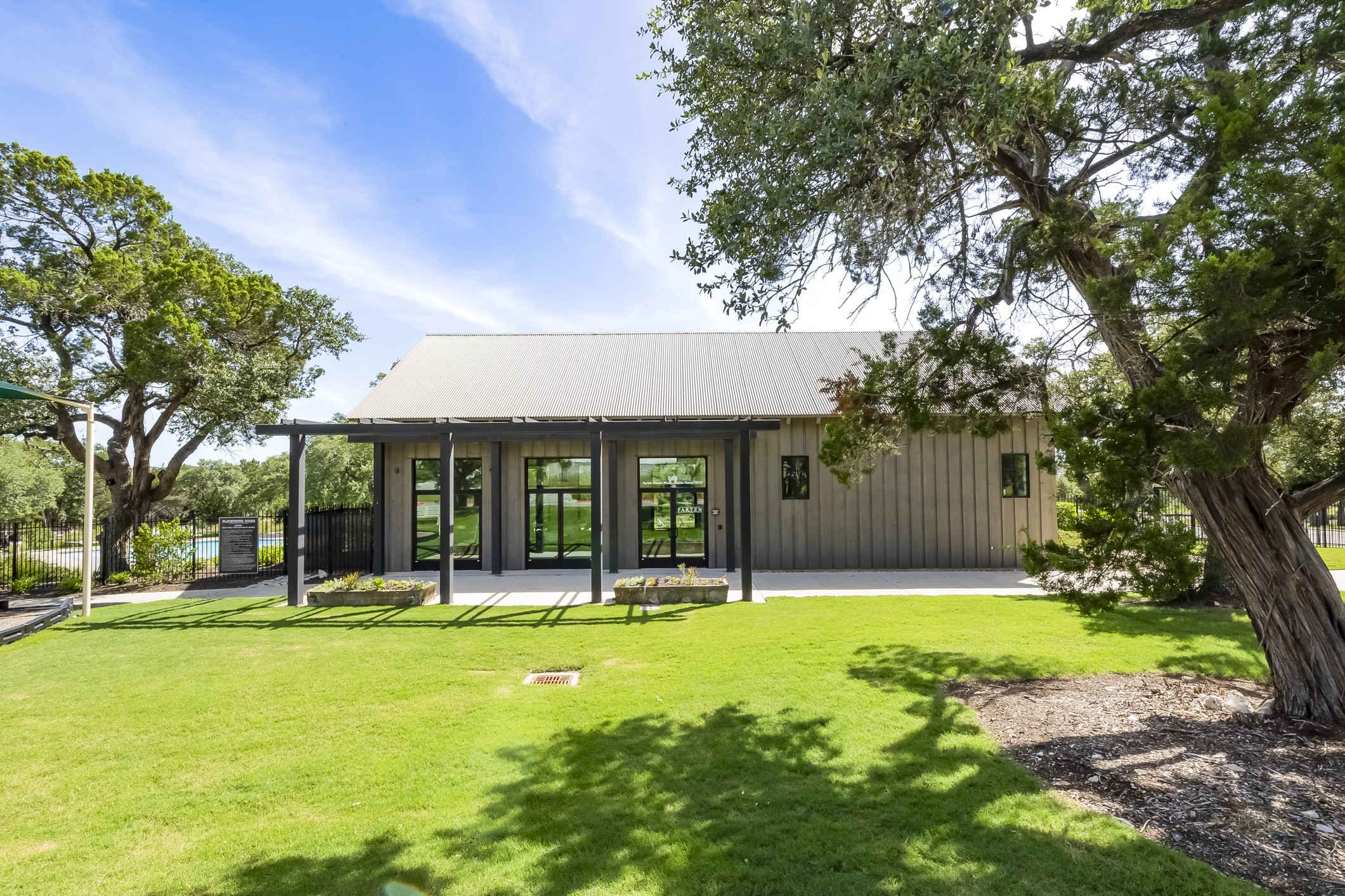 462 Old Stone Road Austin, TX 78737 - Photo 31 of 39 a front view of house with yard and green space