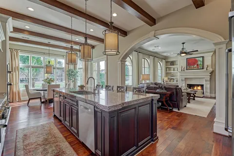 a open kitchen with stainless steel appliances granite countertop lots of counter top space