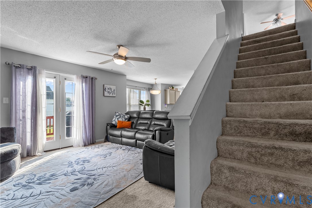 3363 Darbytown Road Henrico, VA 23231 - Photo 19 of 33 a living room with furniture and stairs