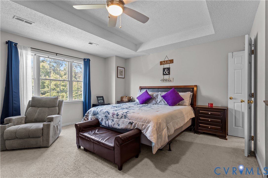 3363 Darbytown Road Henrico, VA 23231 - Photo 21 of 33 a bedroom with a bed and a couch