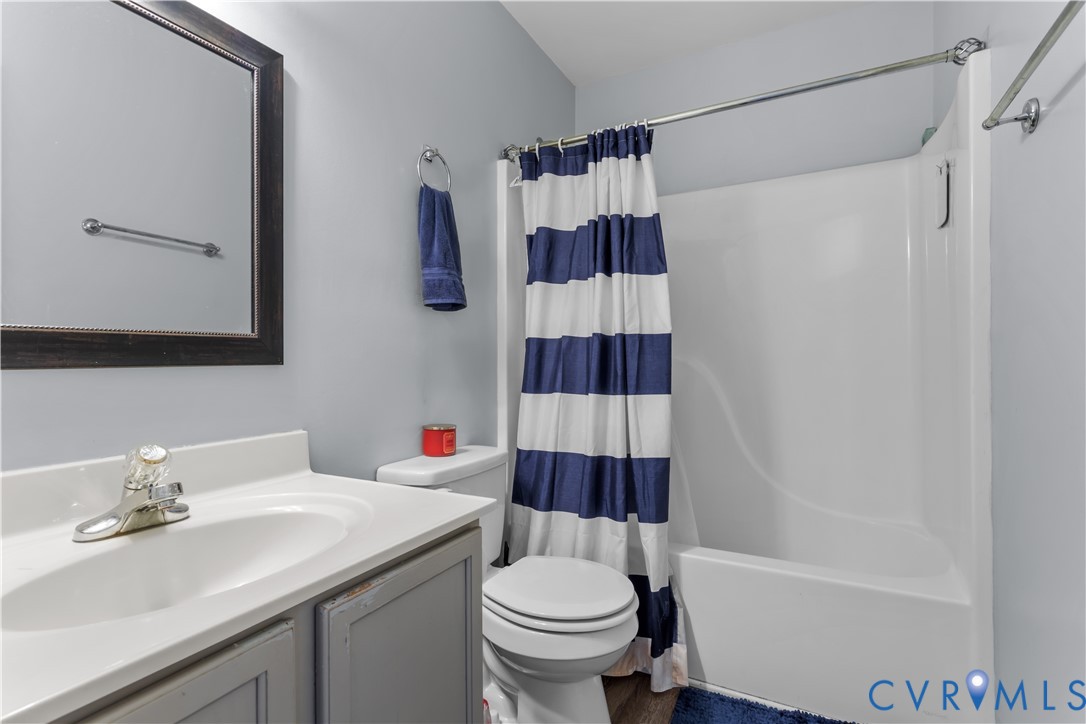 3363 Darbytown Road Henrico, VA 23231 - Photo 29 of 33 a bathroom with a sink toilet and shower