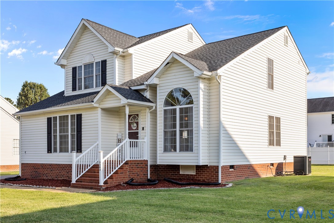 3363 Darbytown Road Henrico, VA 23231 - Photo 3 of 33 a front view of a house with a yard