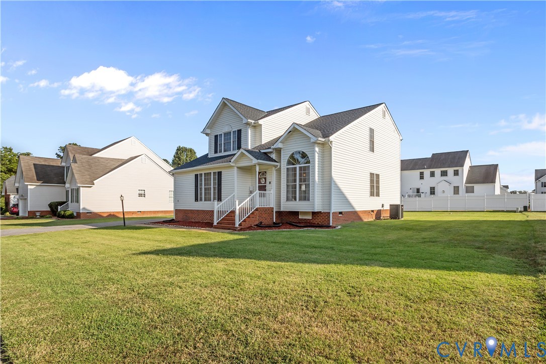 3363 Darbytown Road Henrico, VA 23231 - Photo 4 of 33 a view of a house with a big yard and large trees