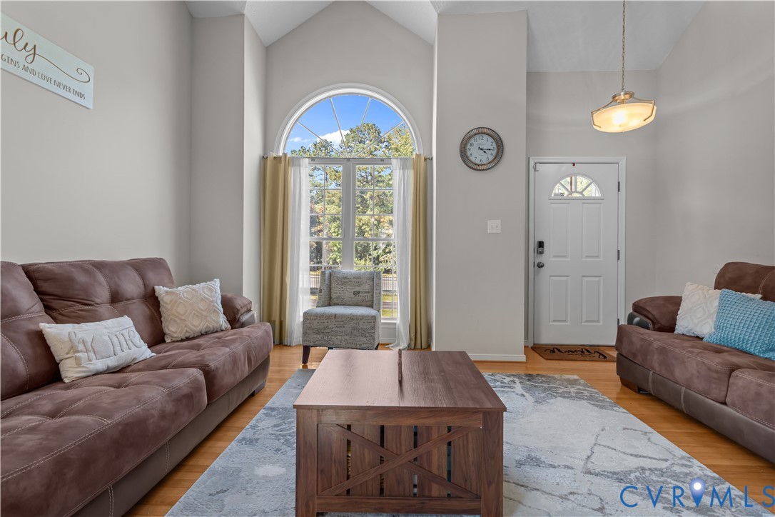 3363 Darbytown Road Henrico, VA 23231 - Photo 6 of 33 a living room with furniture and a large window