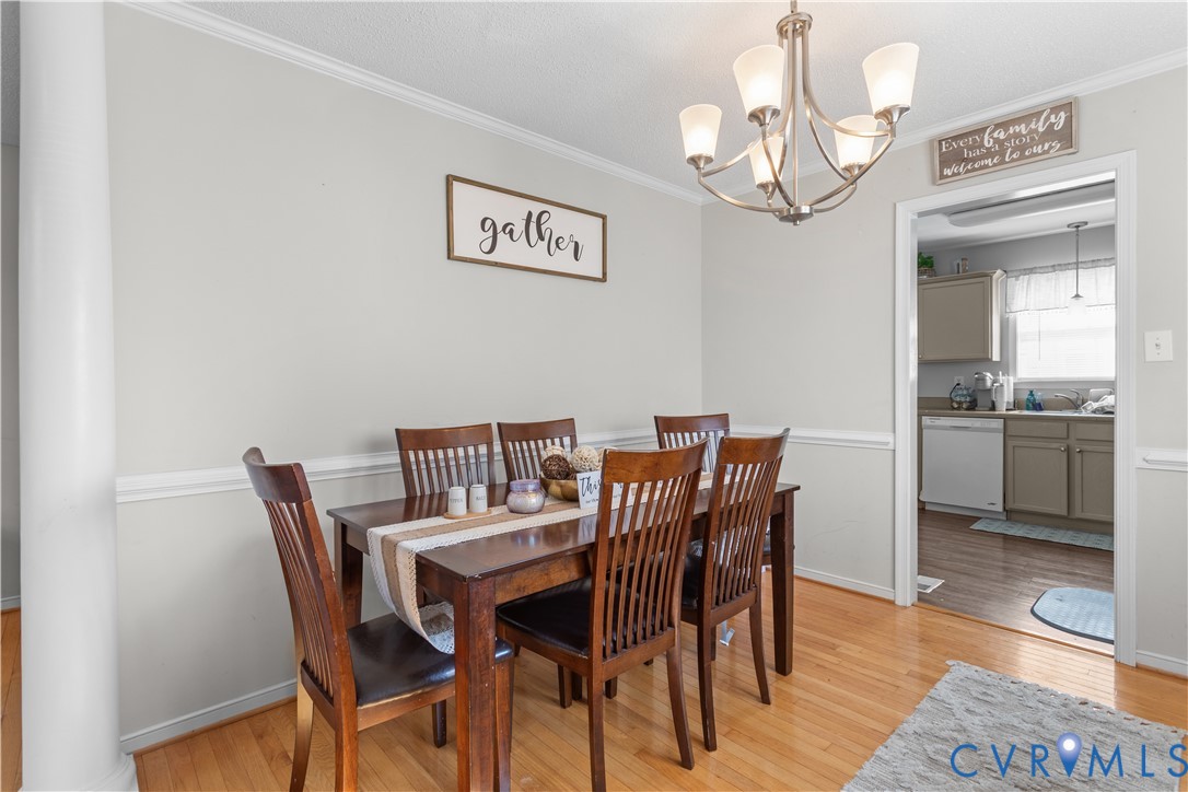 3363 Darbytown Road Henrico, VA 23231 - Photo 9 of 33 a view of a dining room with furniture and wooden floor