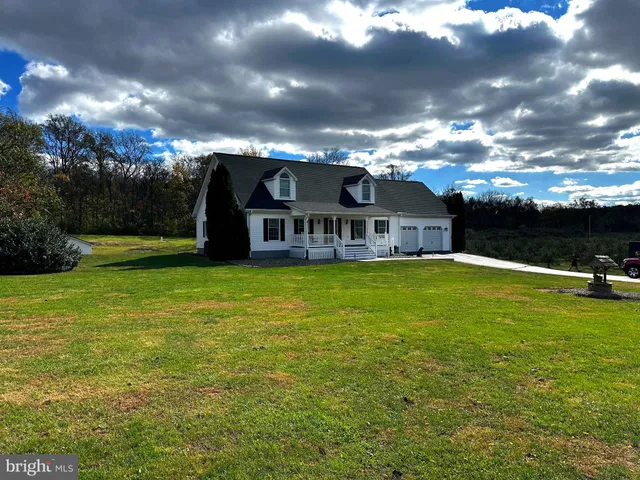 a view of a house with a big yard
