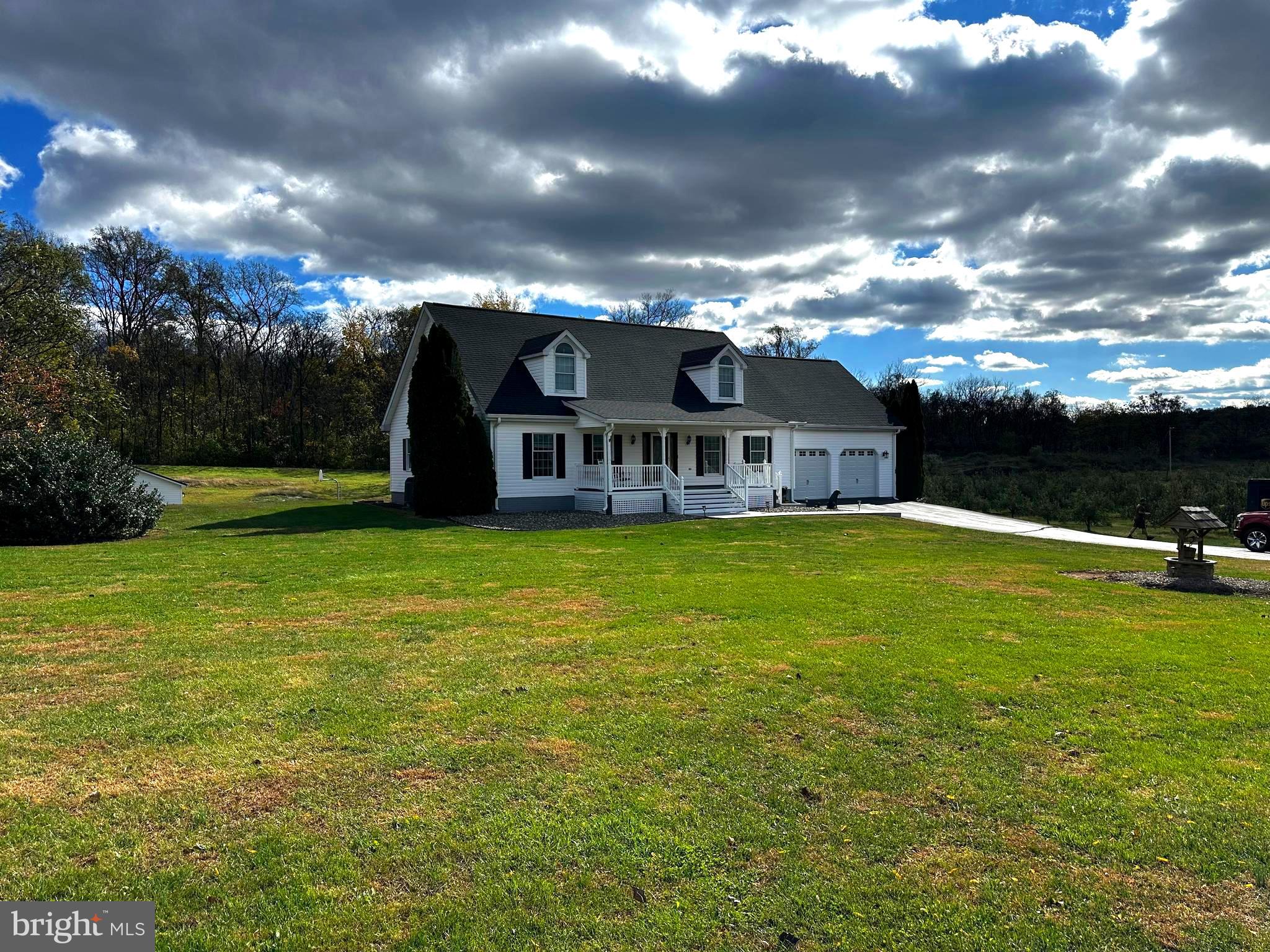 a view of a house with a big yard
