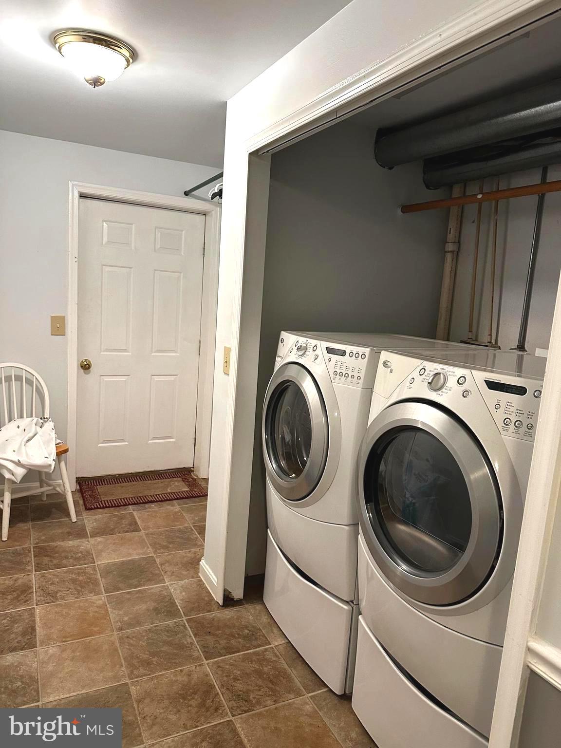 25 Mish Road Bunker Hill, WV 25413 - Photo 112 of 124 a utility room with dryer and washer