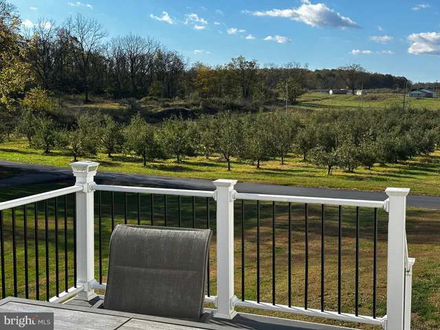 a view of a garage with a bike and car