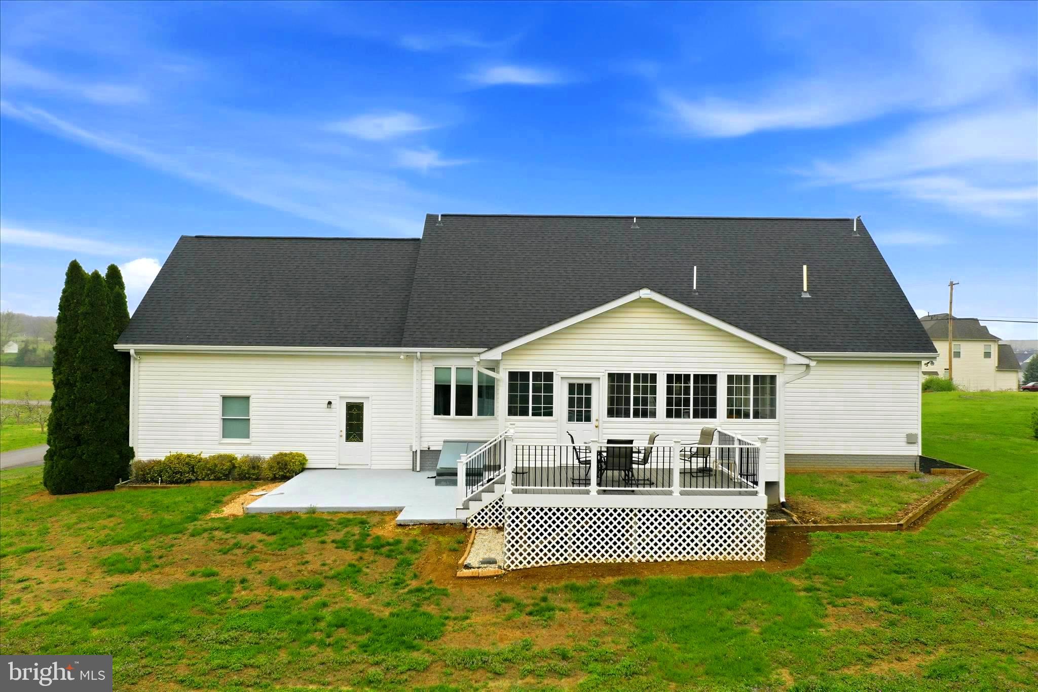 25 Mish Road Bunker Hill, WV 25413 - Photo 21 of 124 a front view of a house with a yard