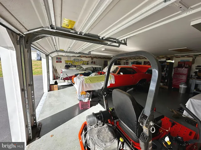 a kitchen with stainless steel appliances granite countertop a refrigerator stove and sink
