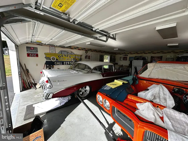 a kitchen with lots of counter top space and stainless steel appliances