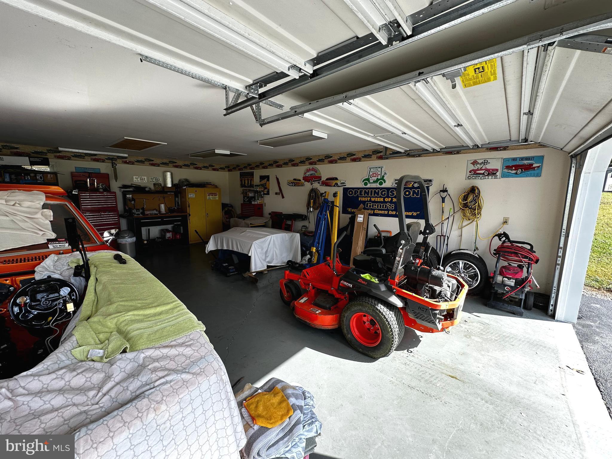 25 Mish Road Bunker Hill, WV 25413 - Photo 30 of 87 a view of a garage with a bike and car