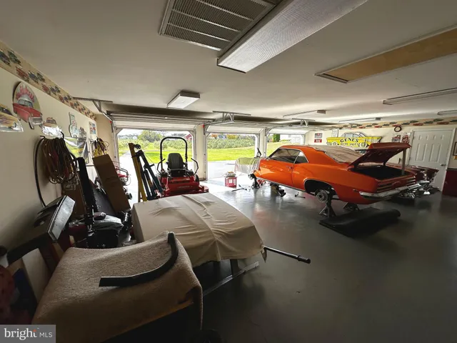 a kitchen with stainless steel appliances granite countertop a stove and a microwave