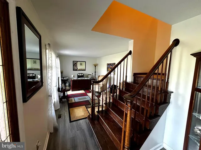 a bed room with a bed and a dresser