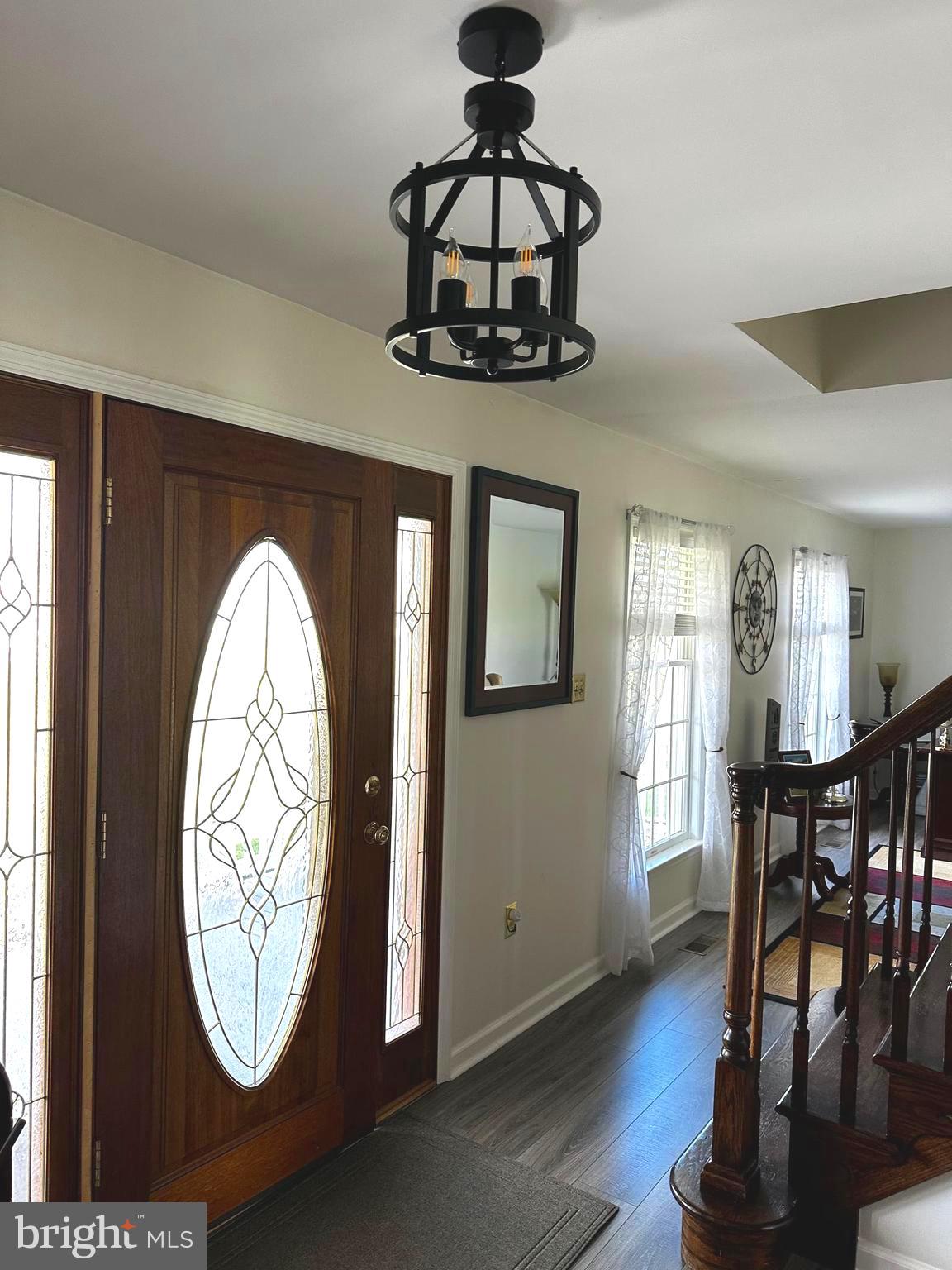 25 Mish Road Bunker Hill, WV 25413 - Photo 39 of 87 a view of dining room with furniture wooden floor and chandelier