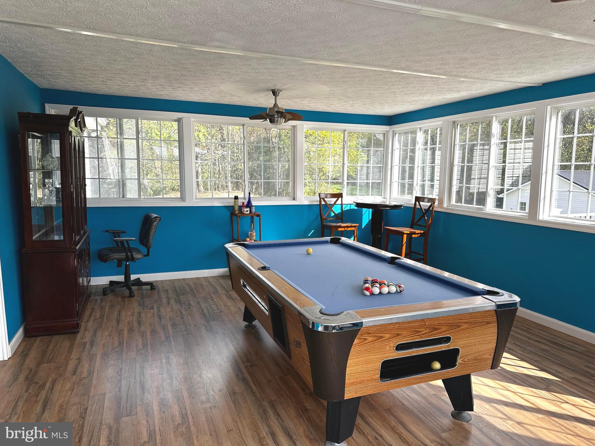 25 Mish Road Bunker Hill, WV 25413 - Photo 66 of 124 POOLTABLE / GAME ROOM WITH PLENTY OF NATURAL LIGHT
