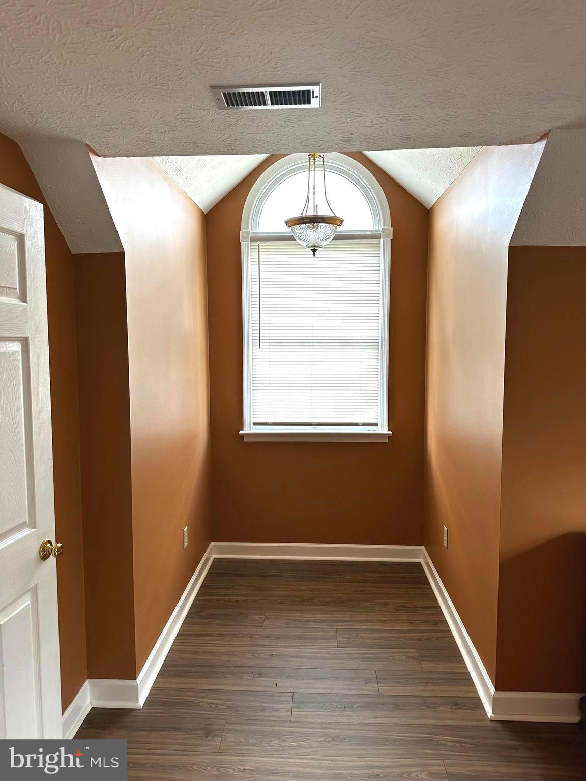 25 Mish Road Bunker Hill, WV 25413 - Photo 67 of 87 a room with wooden floor and windows