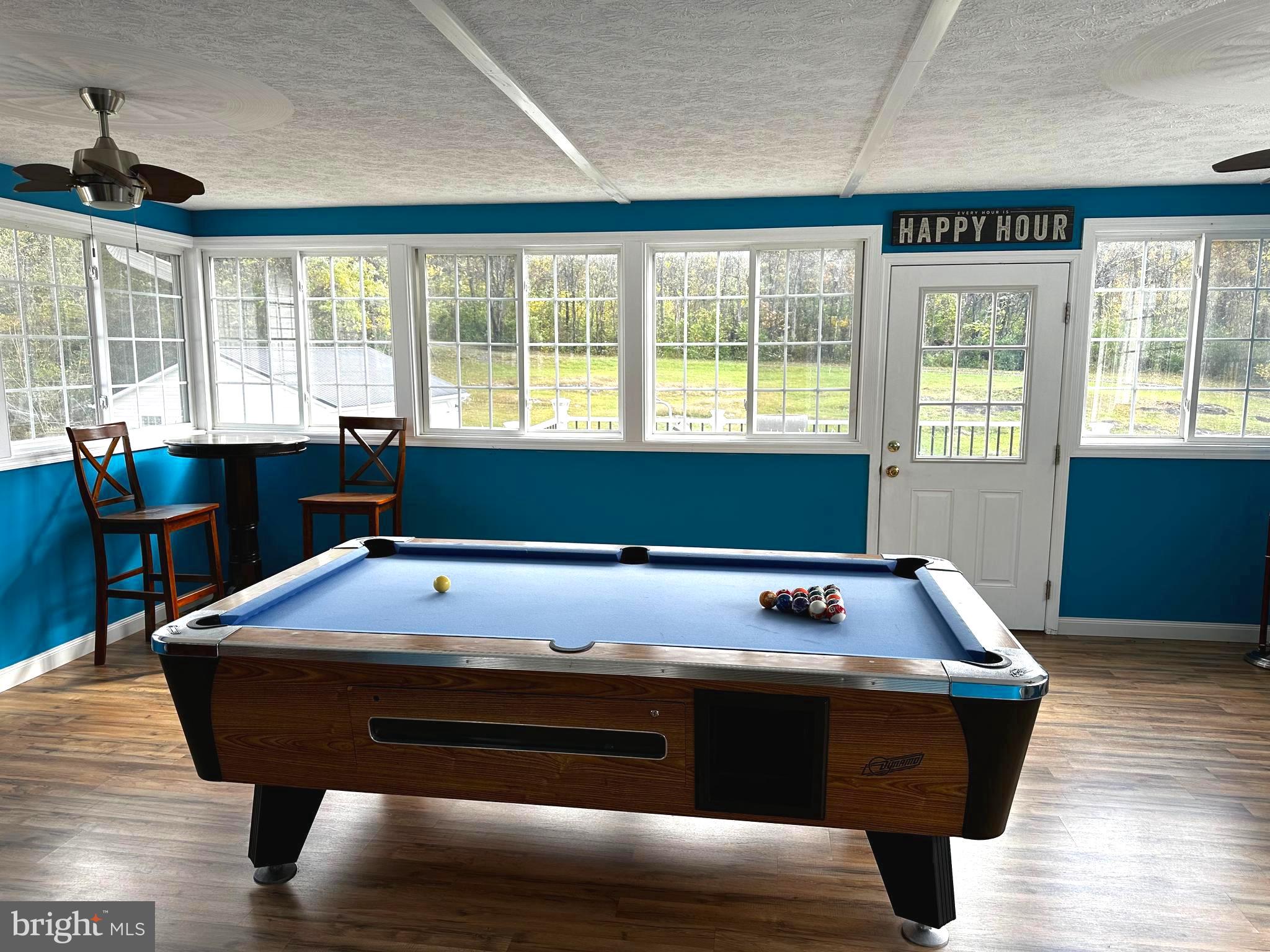 25 Mish Road Bunker Hill, WV 25413 - Photo 67 of 124 POOLTABLE / GAME ROOM WITH PLENTY OF NATURAL LIGHT