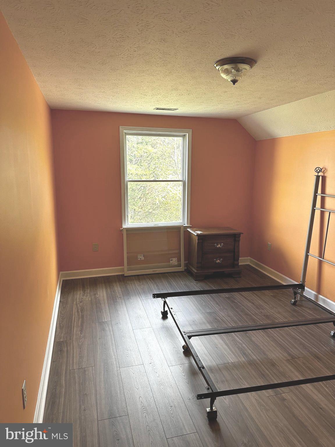 25 Mish Road Bunker Hill, WV 25413 - Photo 69 of 87 BEDROOM #4 w/ NEW LVP FLOORING AND PAINT