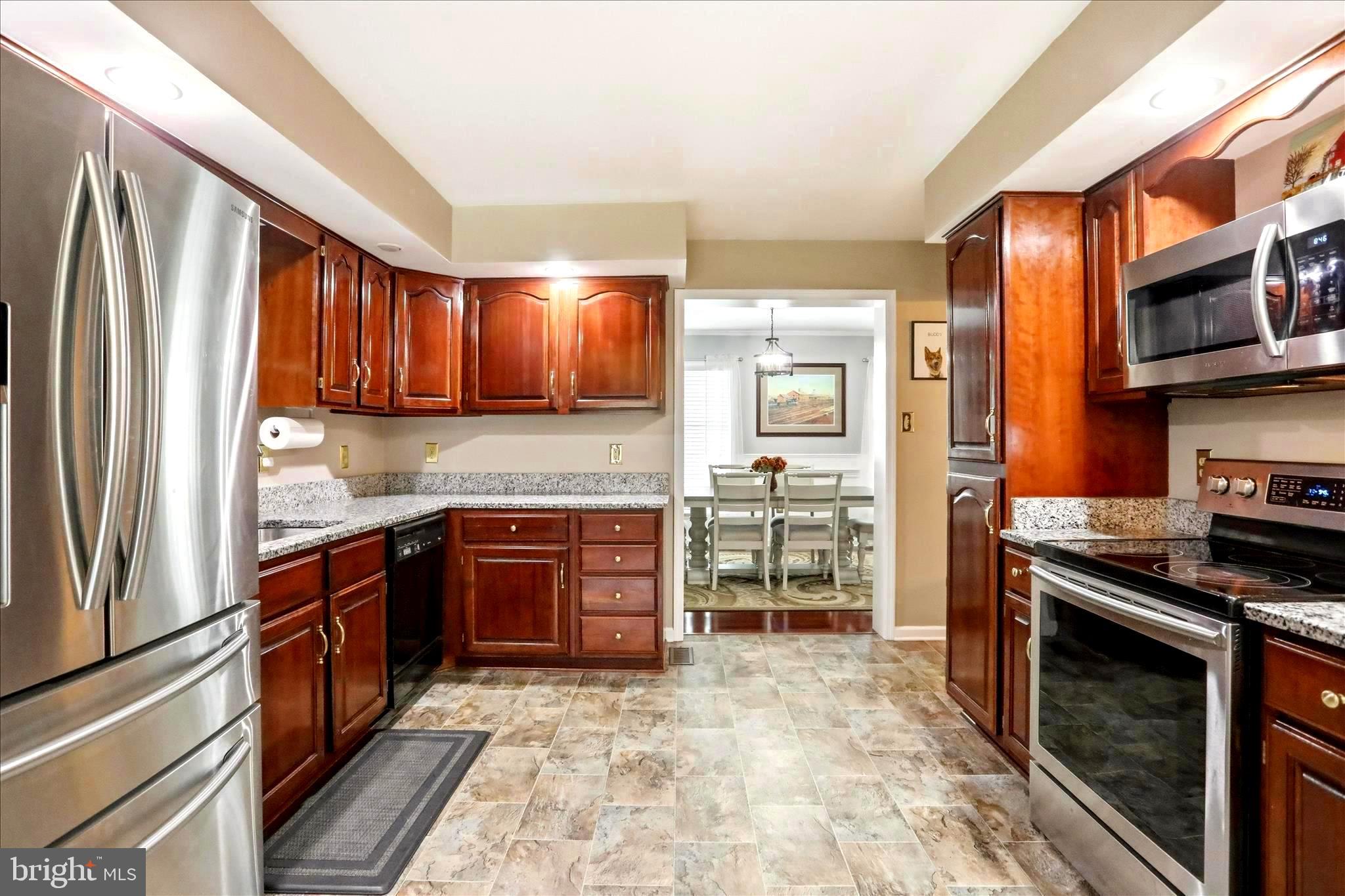 25 Mish Road Bunker Hill, WV 25413 - Photo 75 of 124 KITCHEN OPENS TO FORMAL DINING ROOM