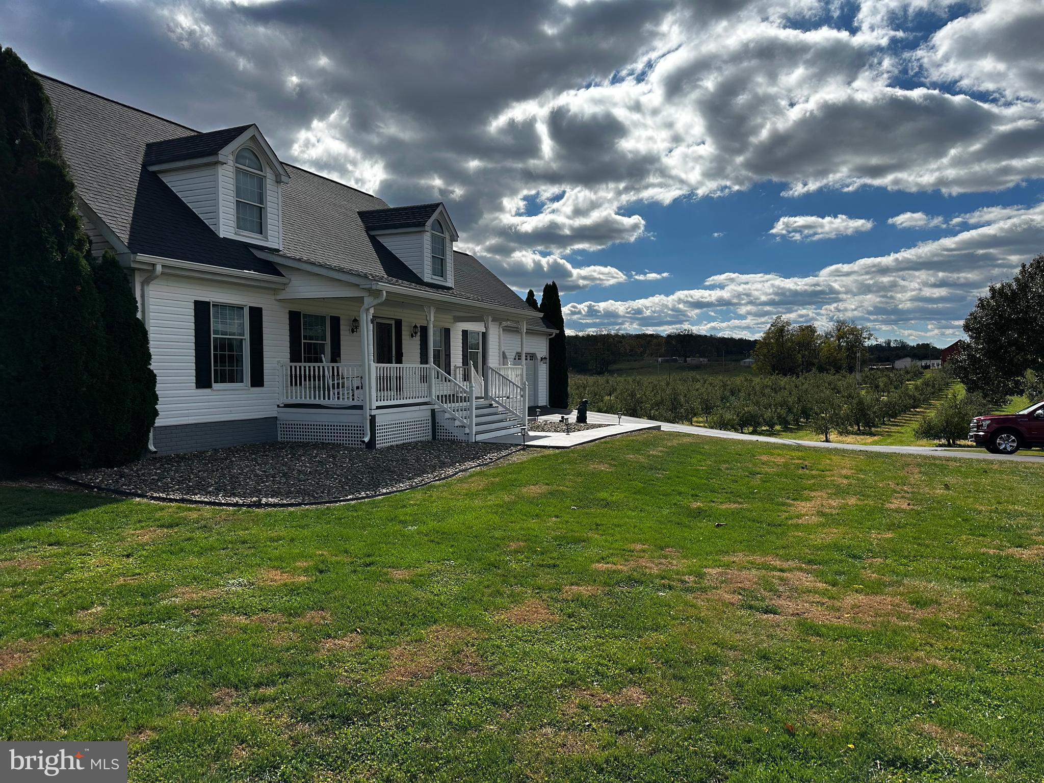 25 Mish Road Bunker Hill, WV 25413 - Photo 8 of 87 a backyard of a house with table and chairs