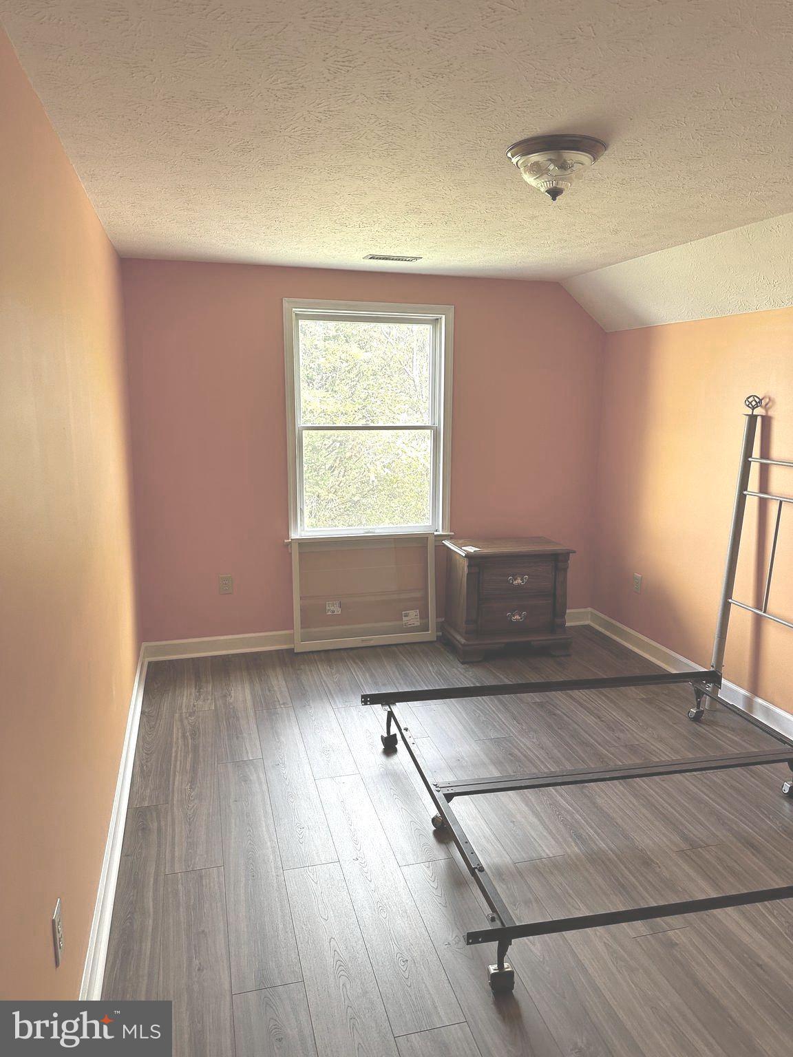 25 Mish Road Bunker Hill, WV 25413 - Photo 99 of 124 BEDROOM #4 w/ NEW LVP FLOORING AND PAINT