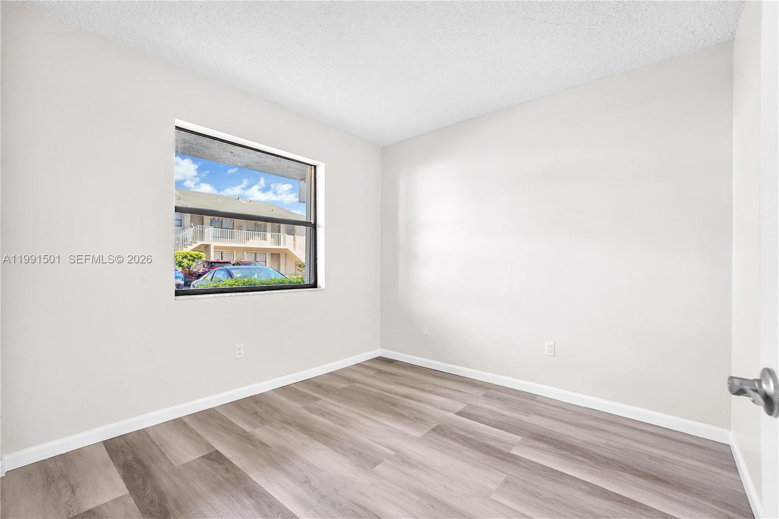 7668 Southwest 152nd Avenue, Unit 2107 Miami, FL 33193 - Photo 14 of 17 a view of an empty room