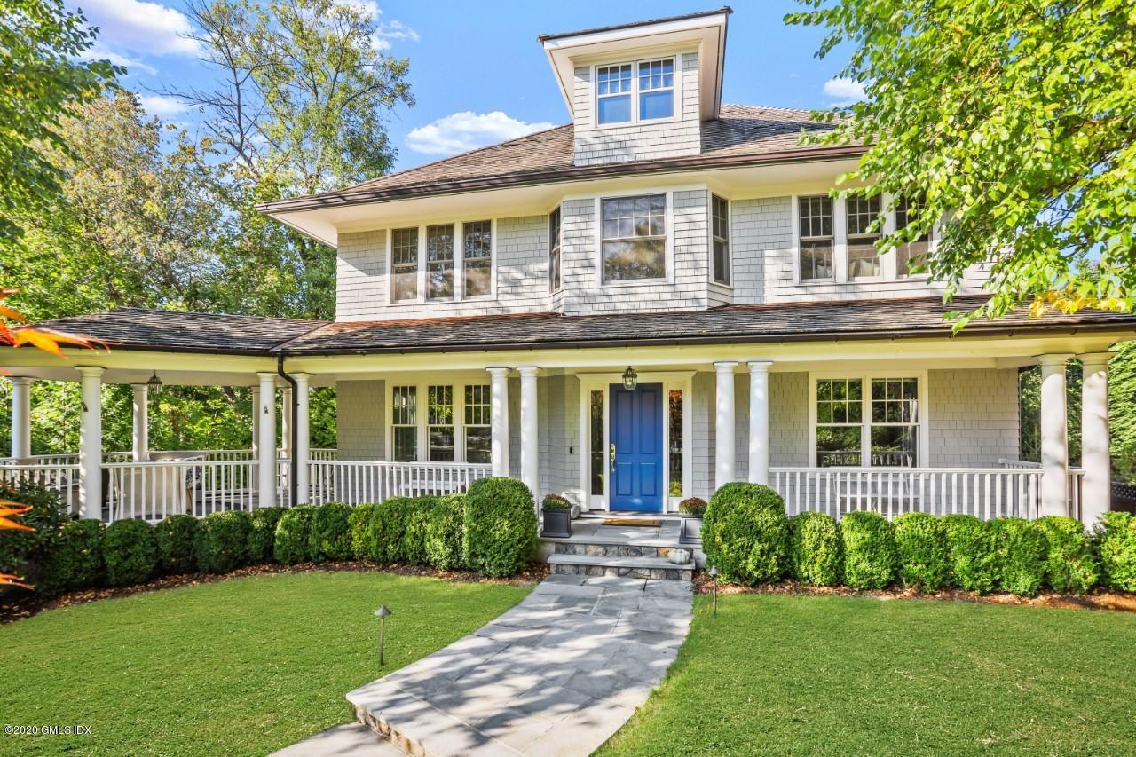67 Lockwood Road Riverside, CT 06878 - Photo 1 of 30 front view of a house that has a yard