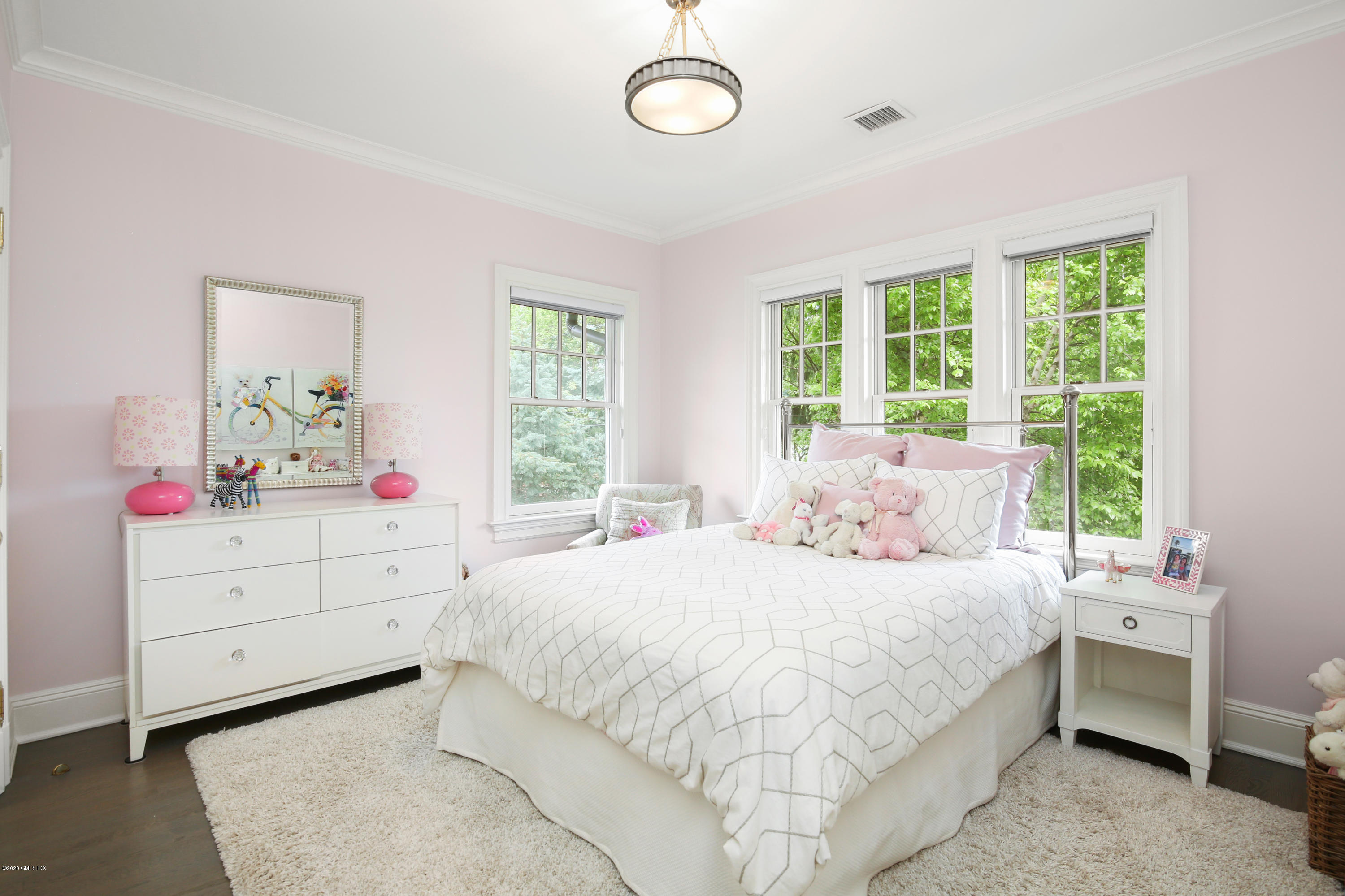 67 Lockwood Road Riverside, CT 06878 - Photo 18 of 30 a bedroom with a bed and a window