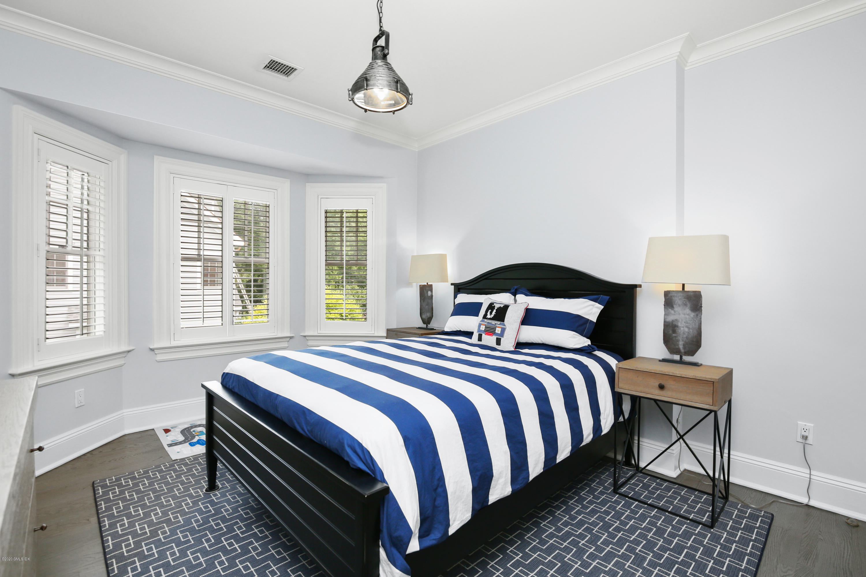 67 Lockwood Road Riverside, CT 06878 - Photo 19 of 30 a bedroom with bed and a window