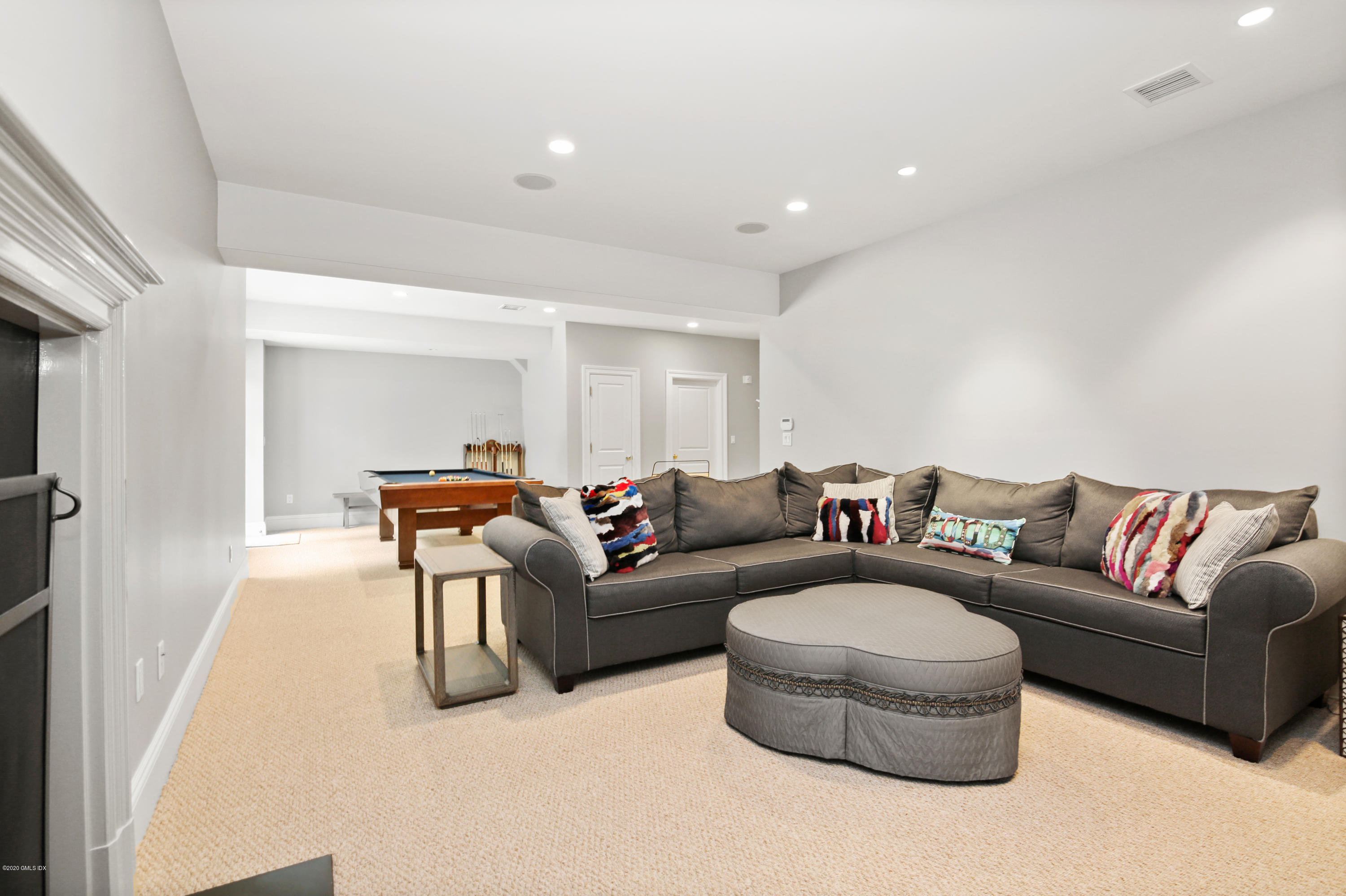 67 Lockwood Road Riverside, CT 06878 - Photo 22 of 30 a living room with furniture and a wooden floor