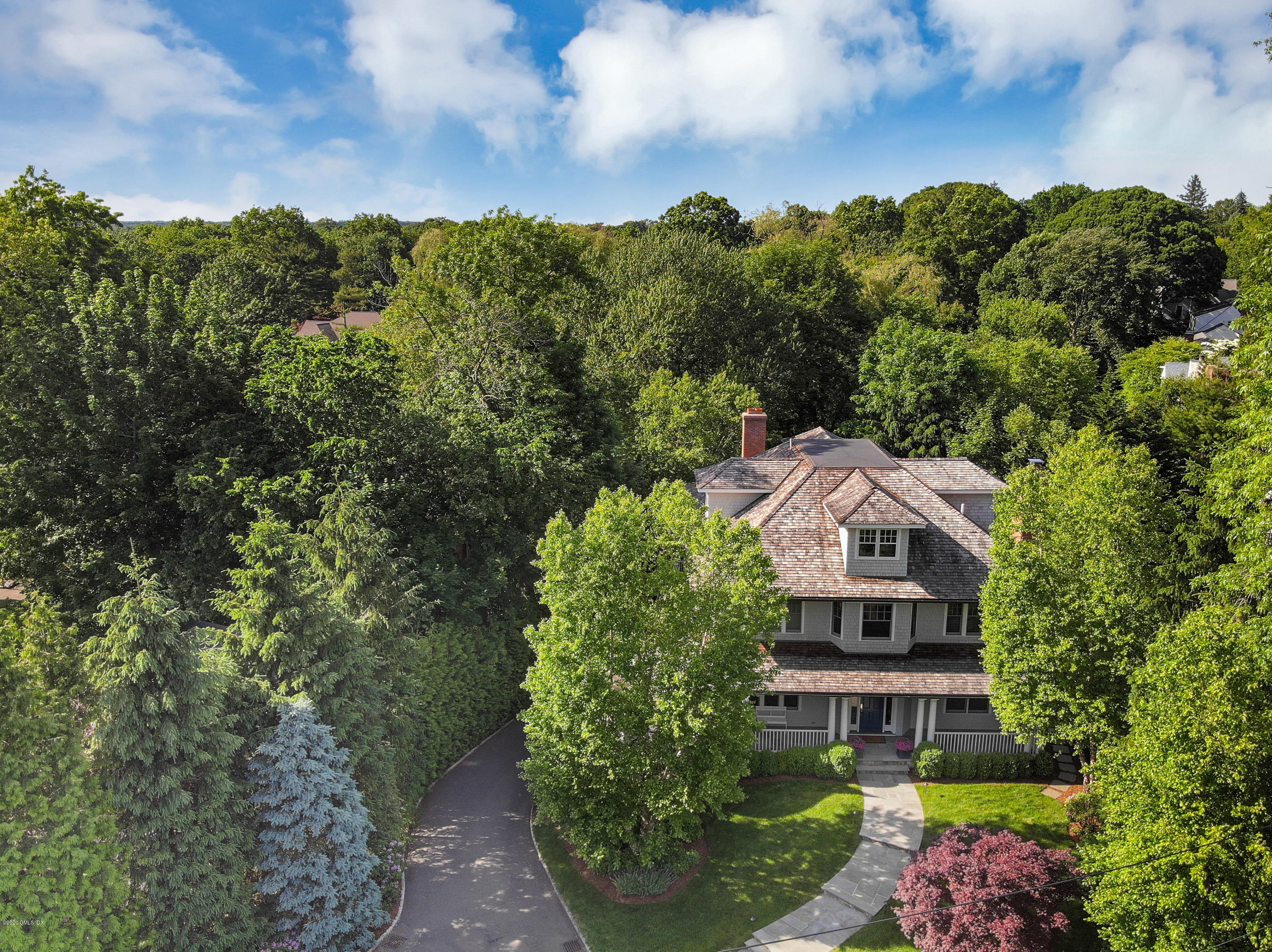 67 Lockwood Road Riverside, CT 06878 - Photo 30 of 30 a aerial view of a house with a yard and balcony