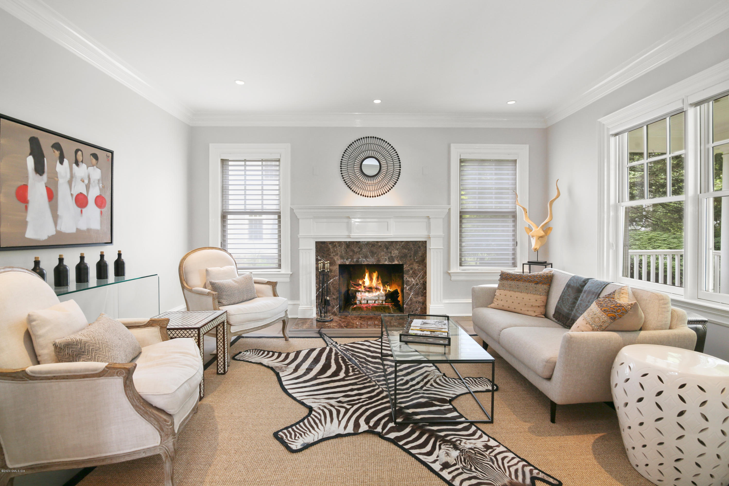 67 Lockwood Road Riverside, CT 06878 - Photo 4 of 30 a living room with furniture and a fireplace