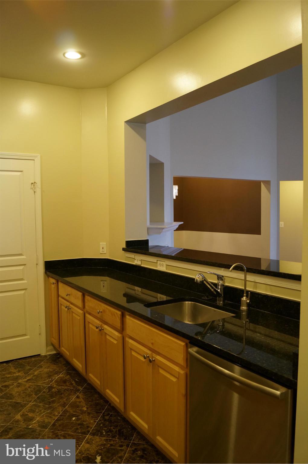 12000 Market Street, Unit 425 Reston, VA 20190 - Photo 13 of 30 a bathroom with a sink and a mirror