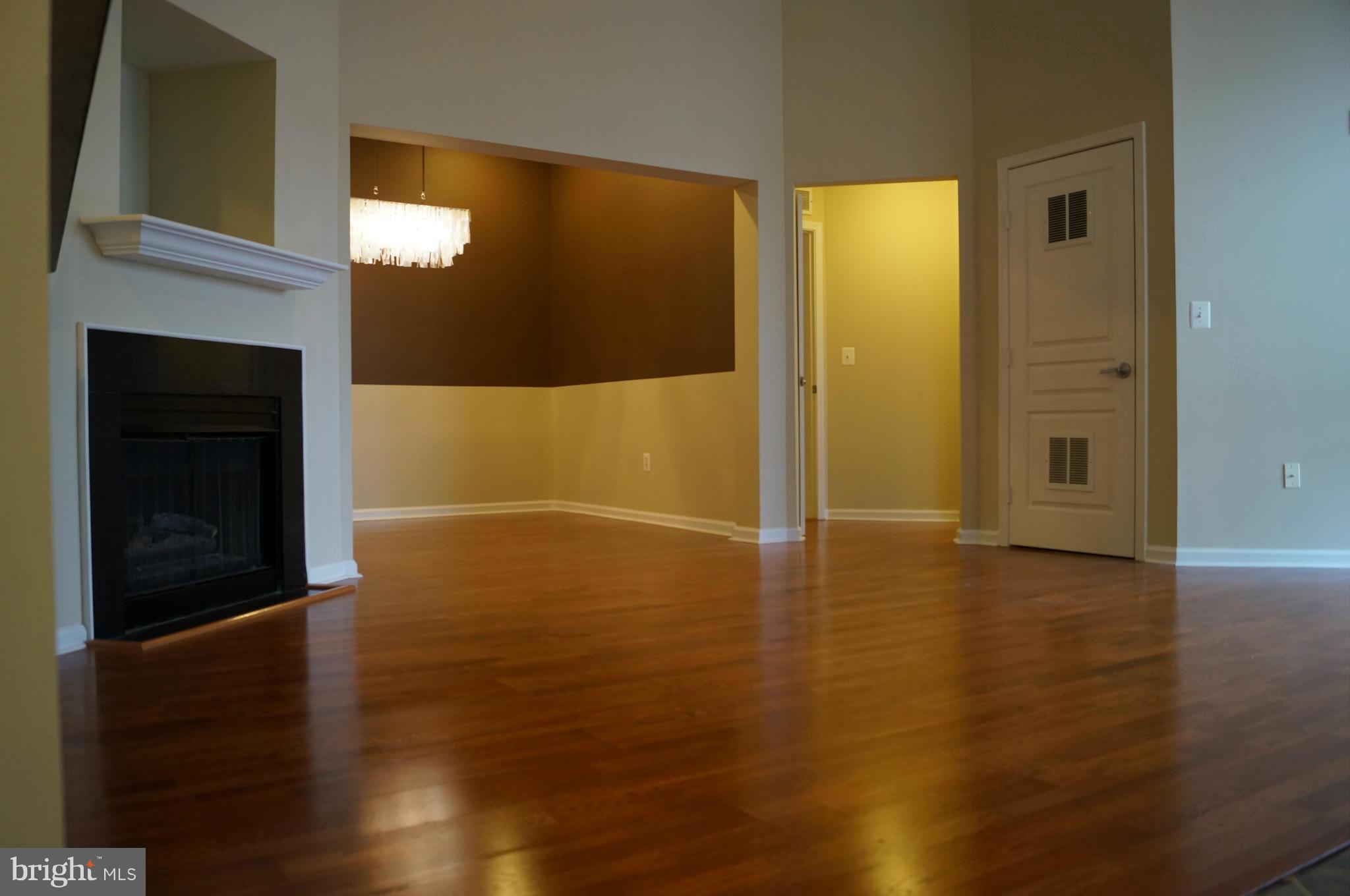 12000 Market Street, Unit 425 Reston, VA 20190 - Photo 24 of 30 a view of livingroom with wooden floor