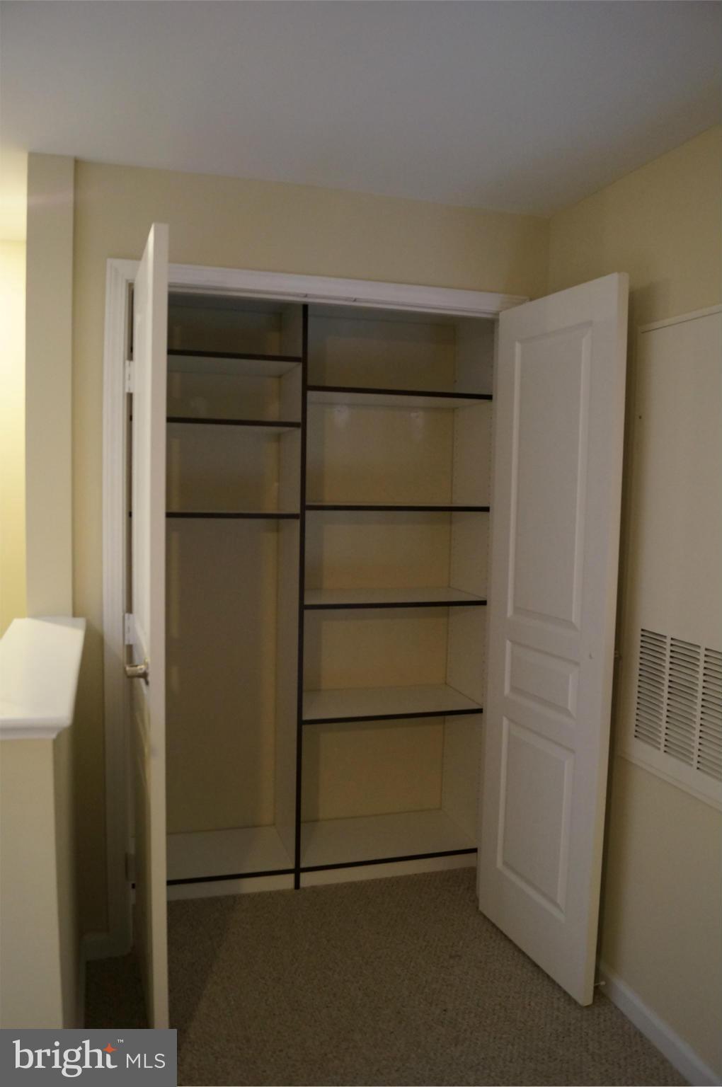 12000 Market Street, Unit 425 Reston, VA 20190 - Photo 28 of 30 a room with an empty space