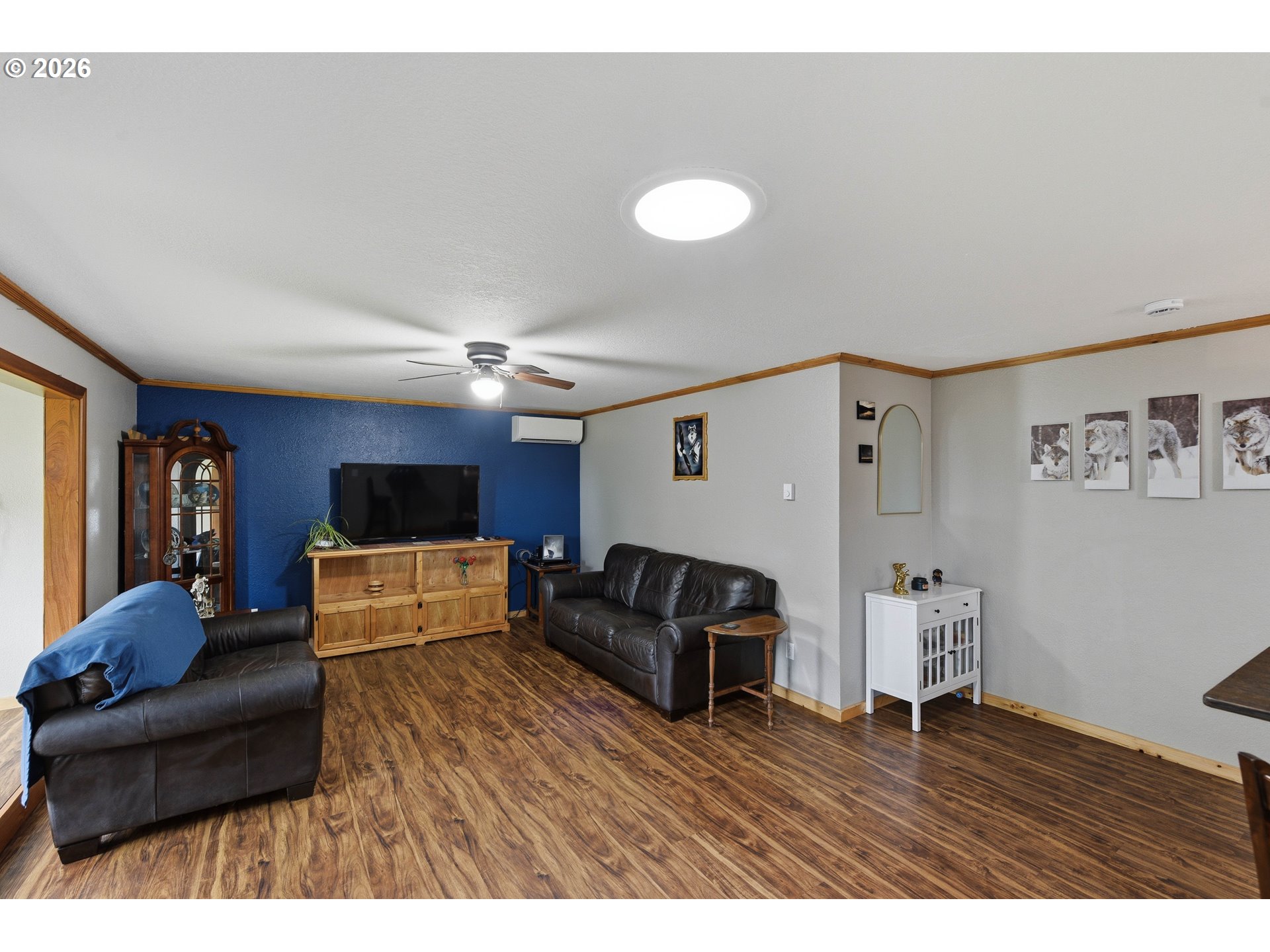 192 North Wood Ridge Road Coquille, OR 97423 - Photo 5 of 42 a living room with furniture and a flat screen tv