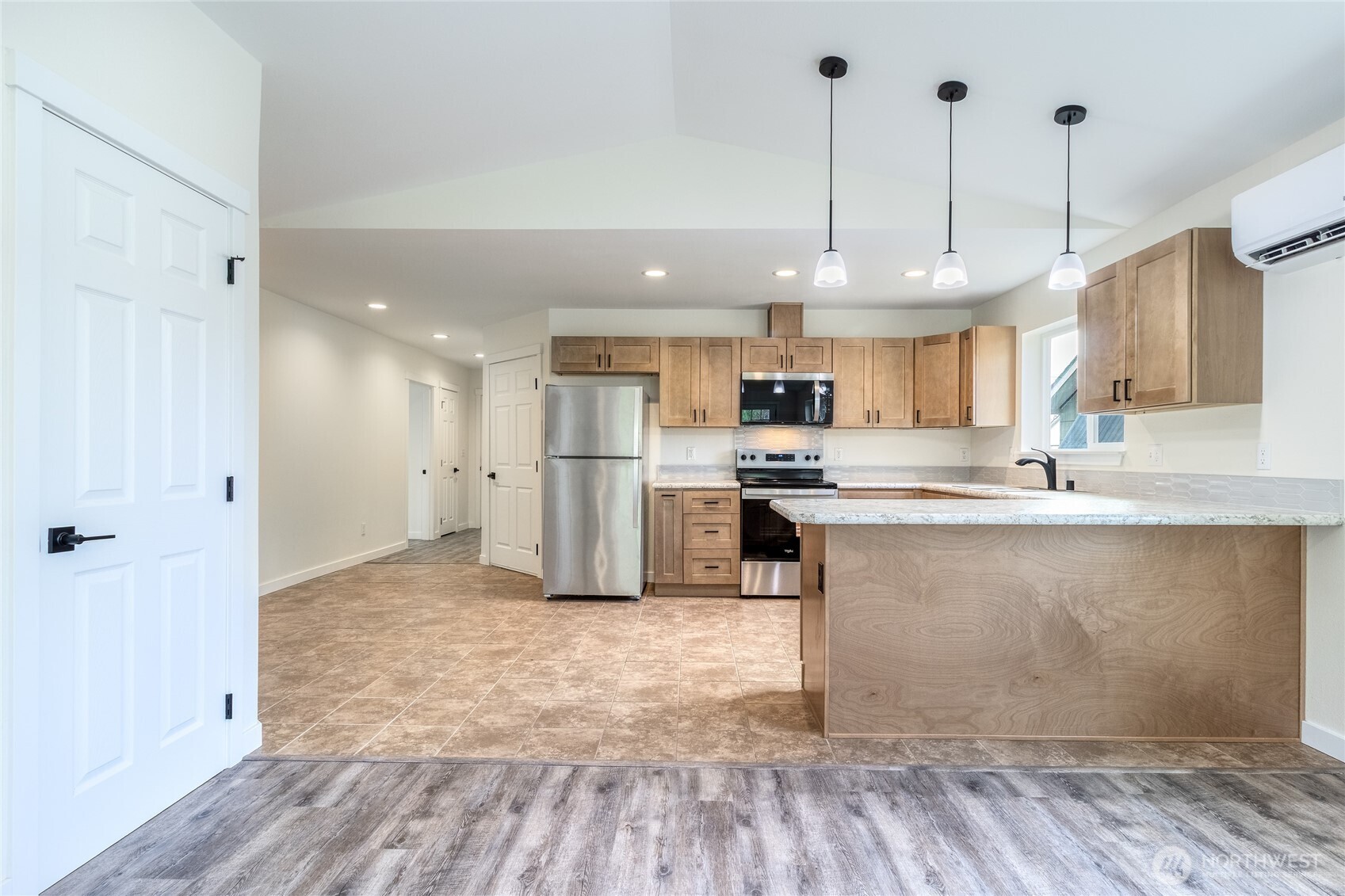 506 Edith Avenue Walla Walla, WA 99362 - Photo 2 of 18 a kitchen with kitchen island a counter top space a sink and appliances