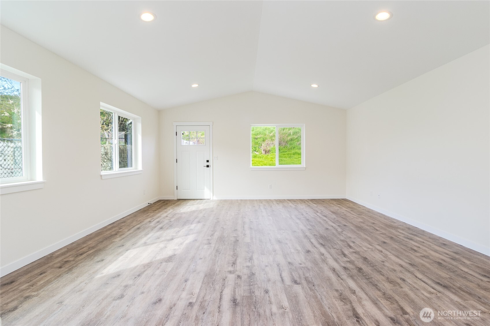 506 Edith Avenue Walla Walla, WA 99362 - Photo 5 of 18 wooden floor in an empty room with a window