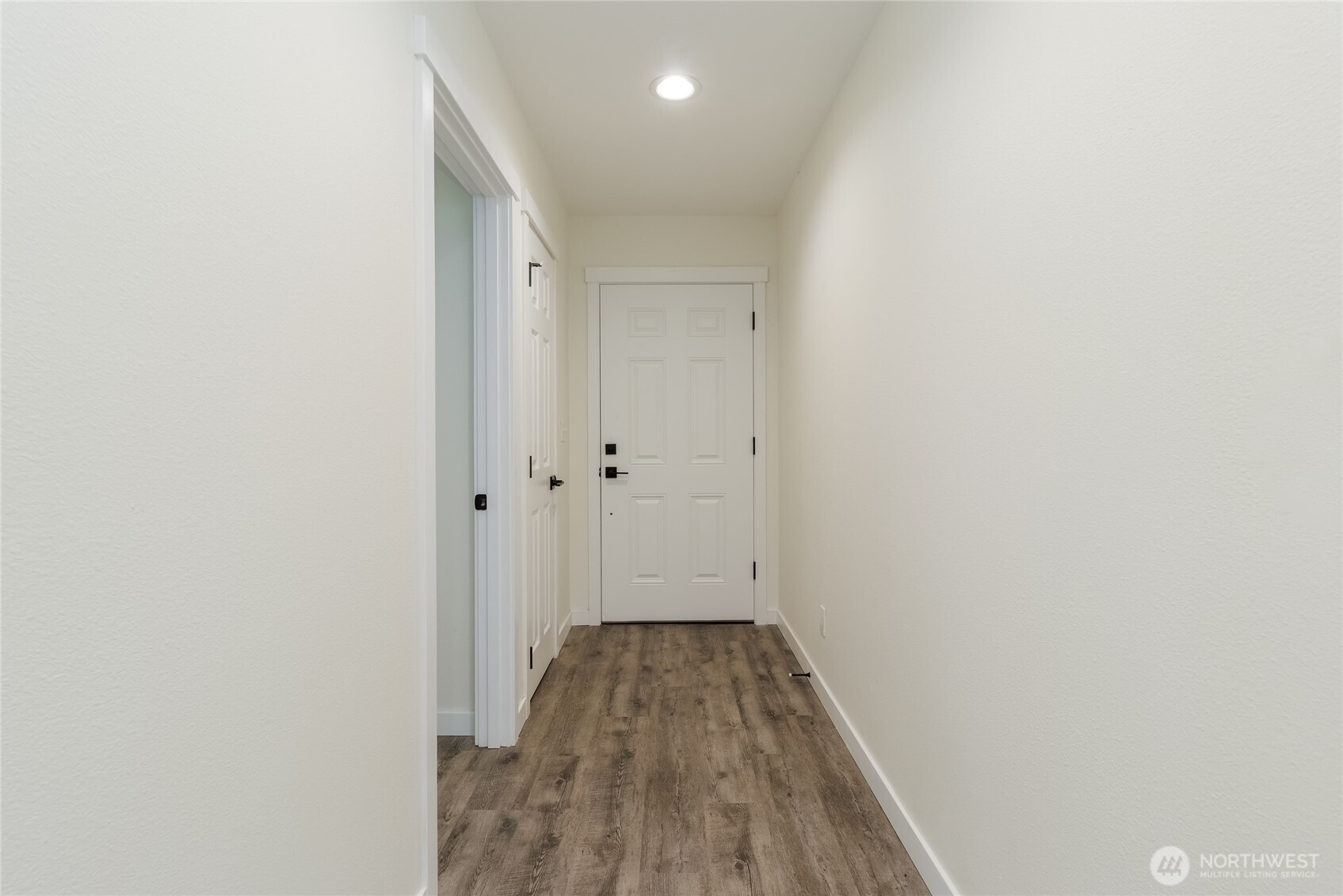 506 Edith Avenue Walla Walla, WA 99362 - Photo 10 of 18 a view of a hallway with wooden floor