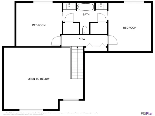a view of a livingroom with a fireplace and workspace