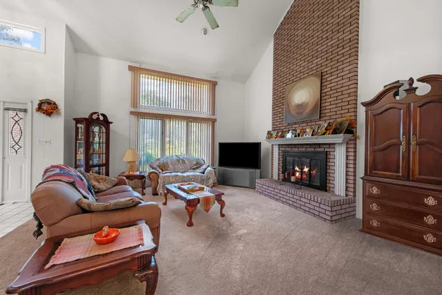 a bathroom with a sink a toilet and a shower
