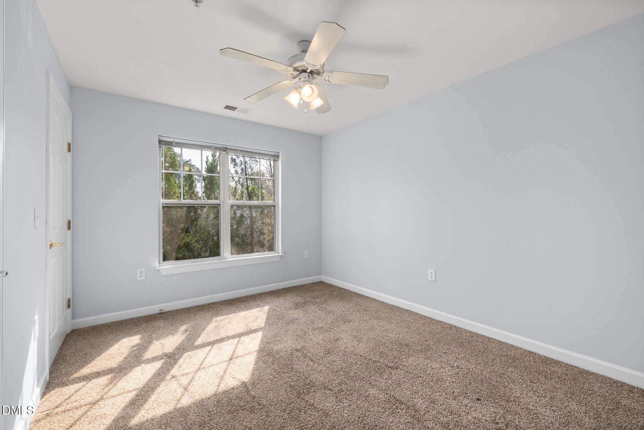 929 Morreene Road, Unit C23 Durham, NC 27705 - Photo 28 of 33 a view of an empty room with a window