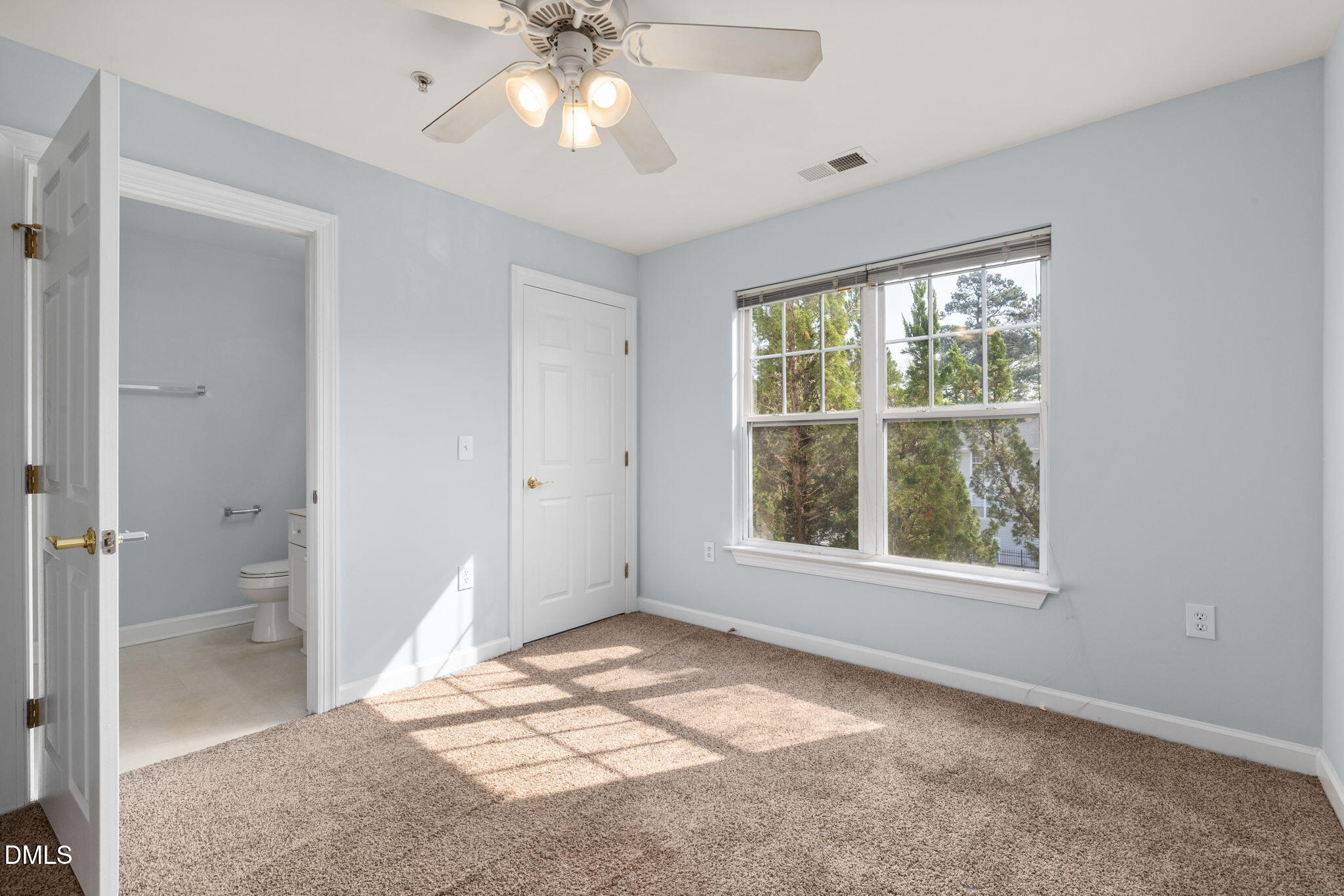 929 Morreene Road, Unit C23 Durham, NC 27705 - Photo 29 of 33 a view of an empty room with a window